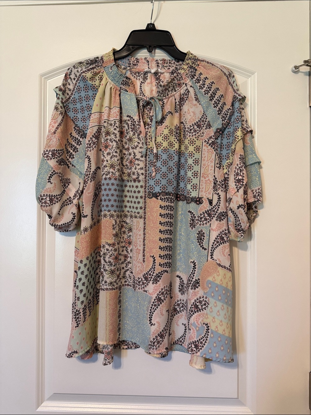 Cynthia Riley Paisley Blouse with a slit at the top with ties.